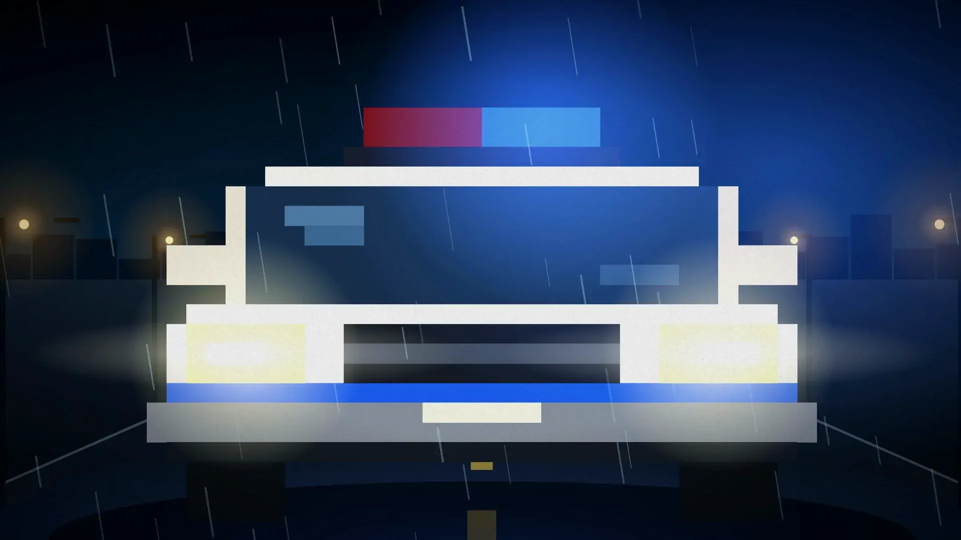 A police car with flashing lights racing down a rainy road at night.